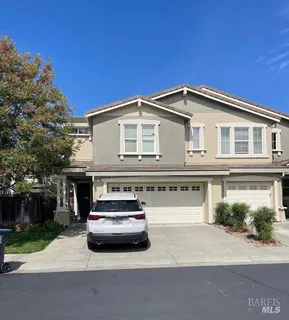 a car parked in front of a house