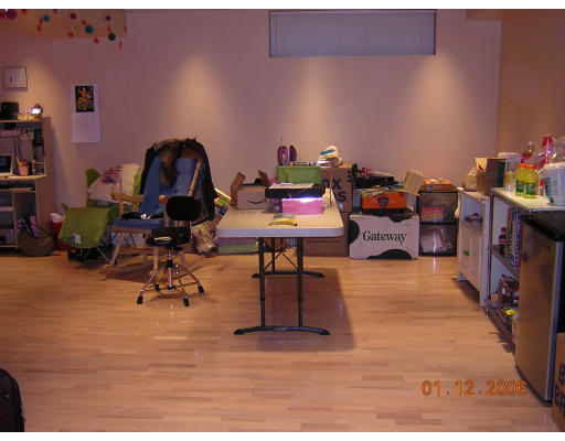 91 Walnut Hill Road Brookline, MA 02467 - Photo 12 of 14 a room with furniture and a wooden floor