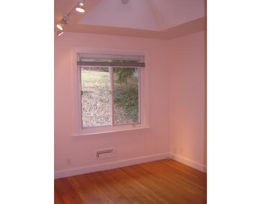 91 Walnut Hill Road Brookline, MA 02467 - Photo 10 of 14 a view of an empty room with a window