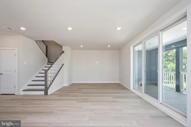 a view of an entryway with stairs