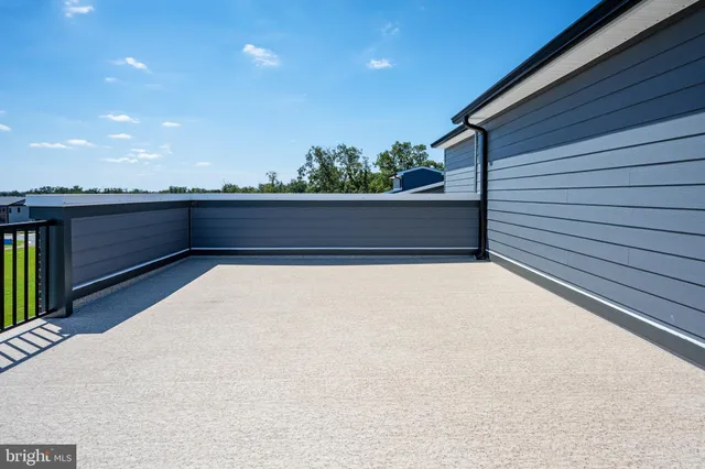 a view of balcony with furniture