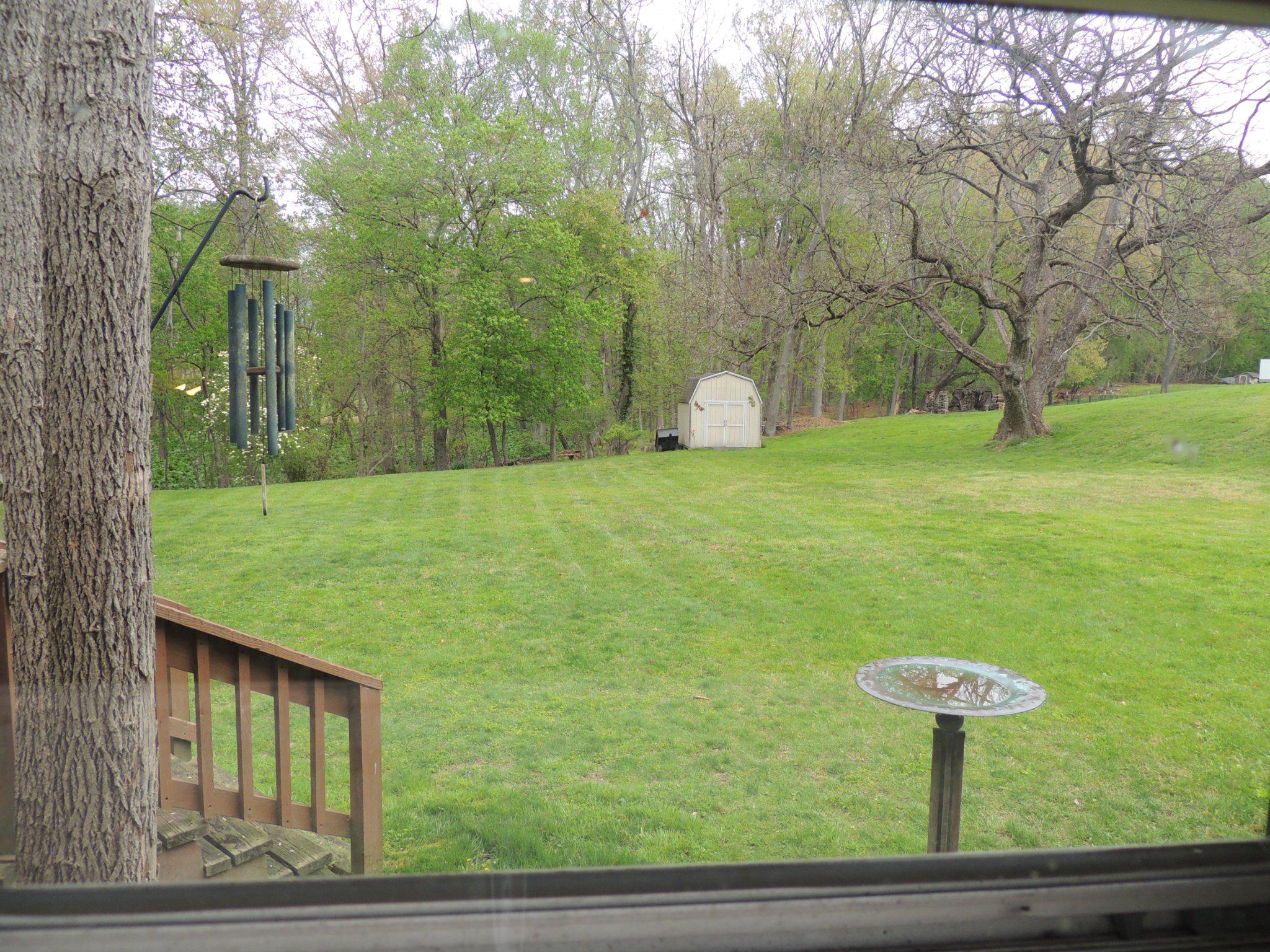 5838 Oklahoma Road Sykesville, MD 21784 - Photo 13 of 72 View from the kitchen window of the quiet backyard