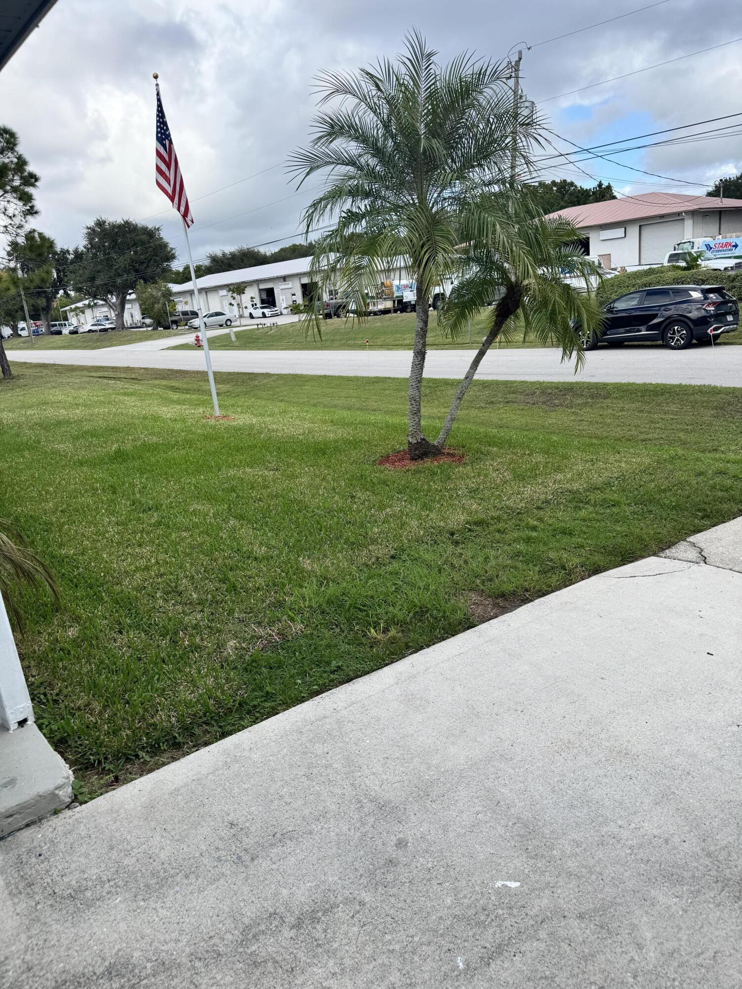 1892 Southwest Biltmore Street Port St. Lucie, FL 34984 - Photo 9 of 11 a view of a backyard with green space
