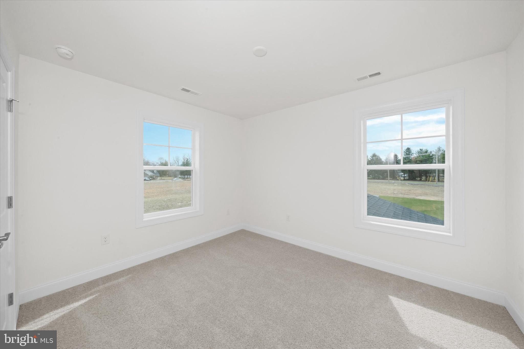 25246 Bethesda Road Georgetown, DE 19947 - Photo 37 of 41 an empty room with a window