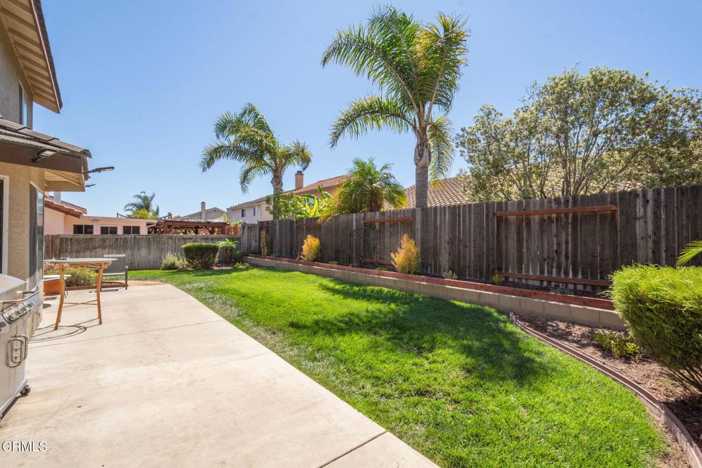 623 Novato Drive Oxnard, CA 93035 - Photo 18 of 22 a view of backyard with outdoor seating and green space