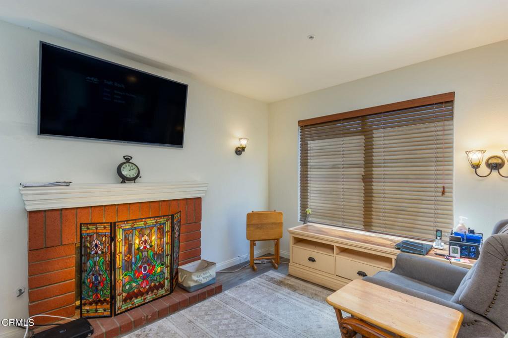 623 Novato Drive Oxnard, CA 93035 - Photo 7 of 22 a view of a livingroom with furniture and a flat screen tv
