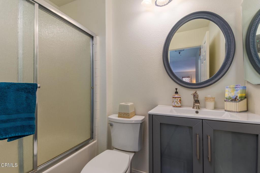 623 Novato Drive Oxnard, CA 93035 - Photo 9 of 22 a bathroom with a sink and a mirror