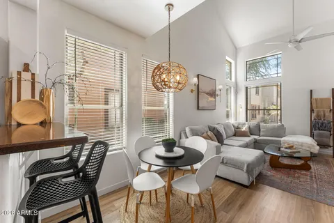a living room with furniture and a table