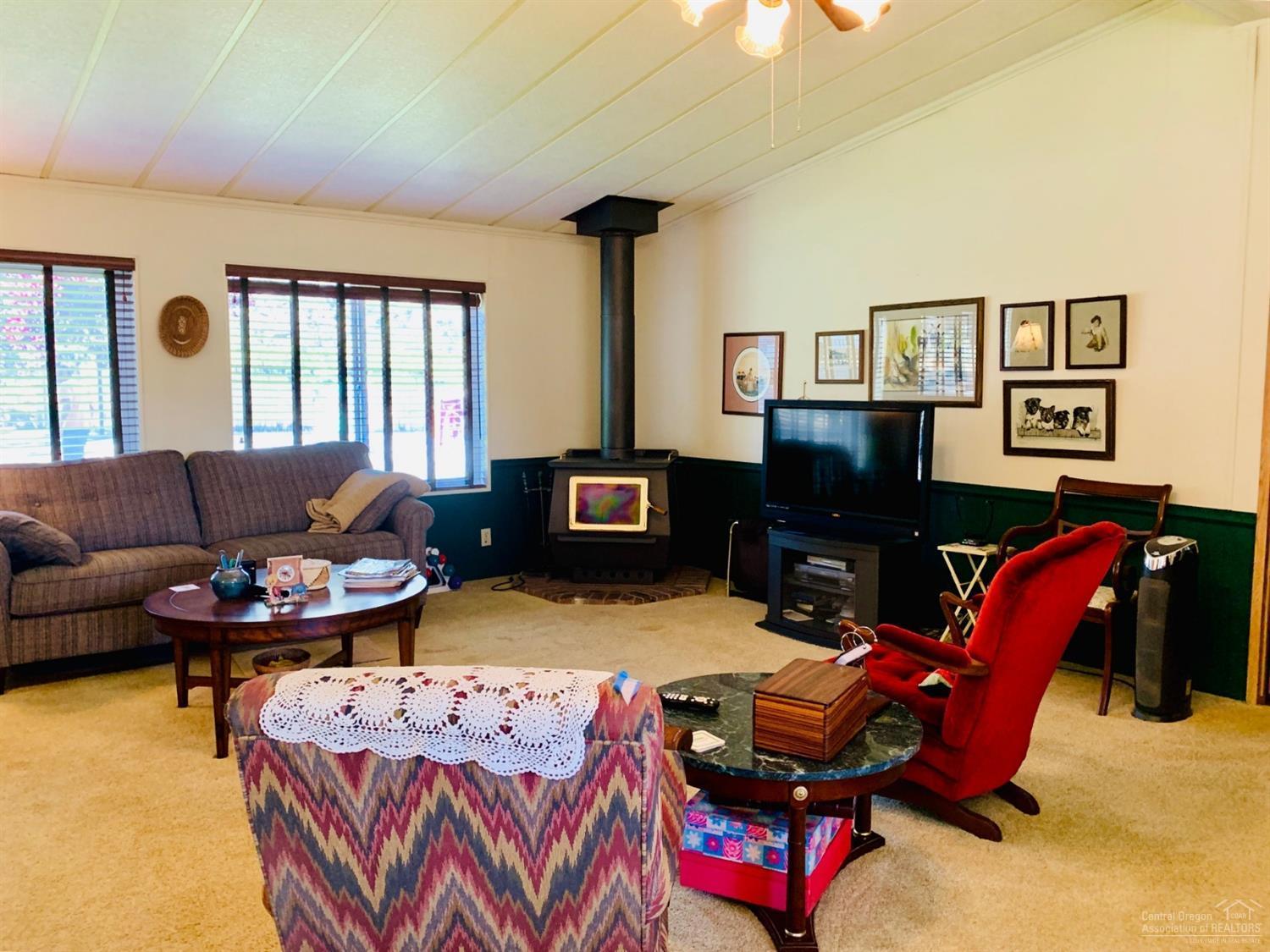 6565 Southeast Canyon Road Prineville, OR 97754 - Photo 11 of 25 Nice wood stove in the living room