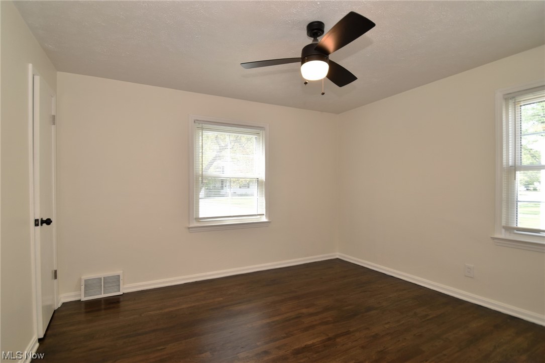 1259 Churchill Road Cleveland, OH 44124 - Photo 13 of 24 Spare room featuring dark hardwood floors