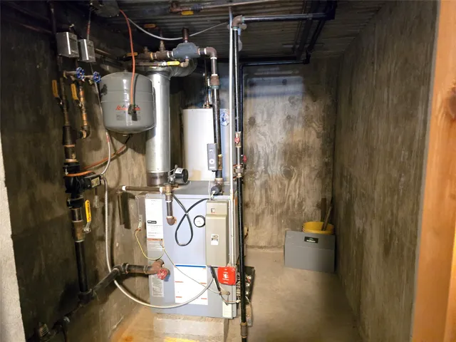 a view of wooden house with a large window