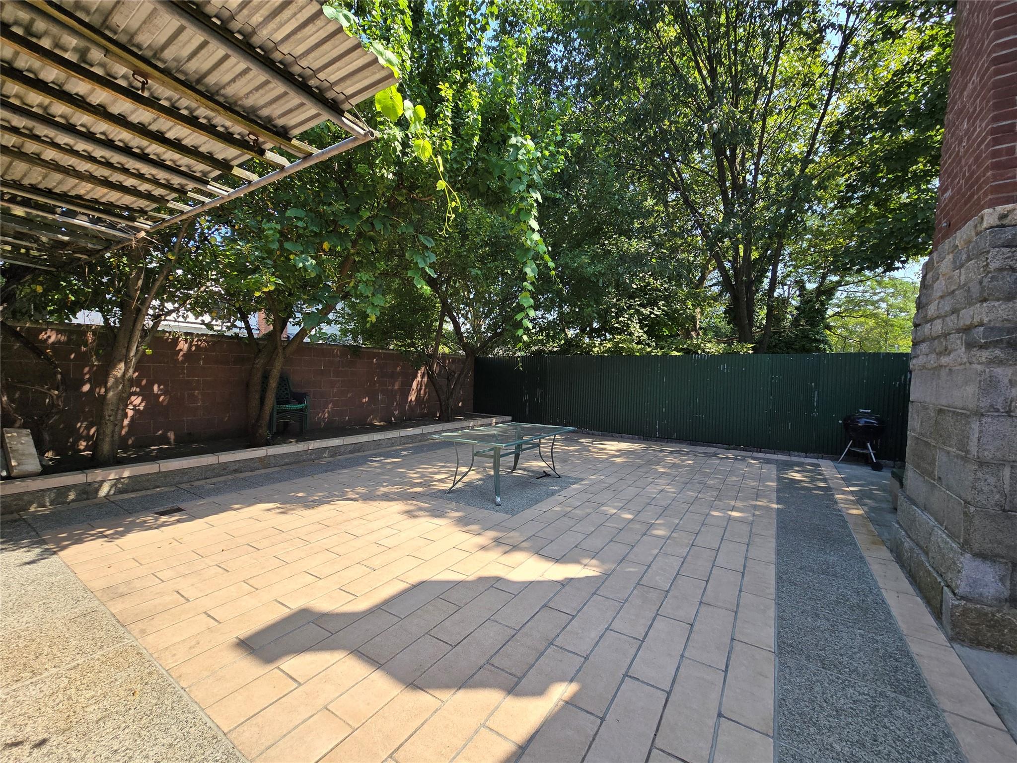 204-19 46th Road Queens, NY 11361 - Photo 22 of 23 a view of backyard with swimming pool