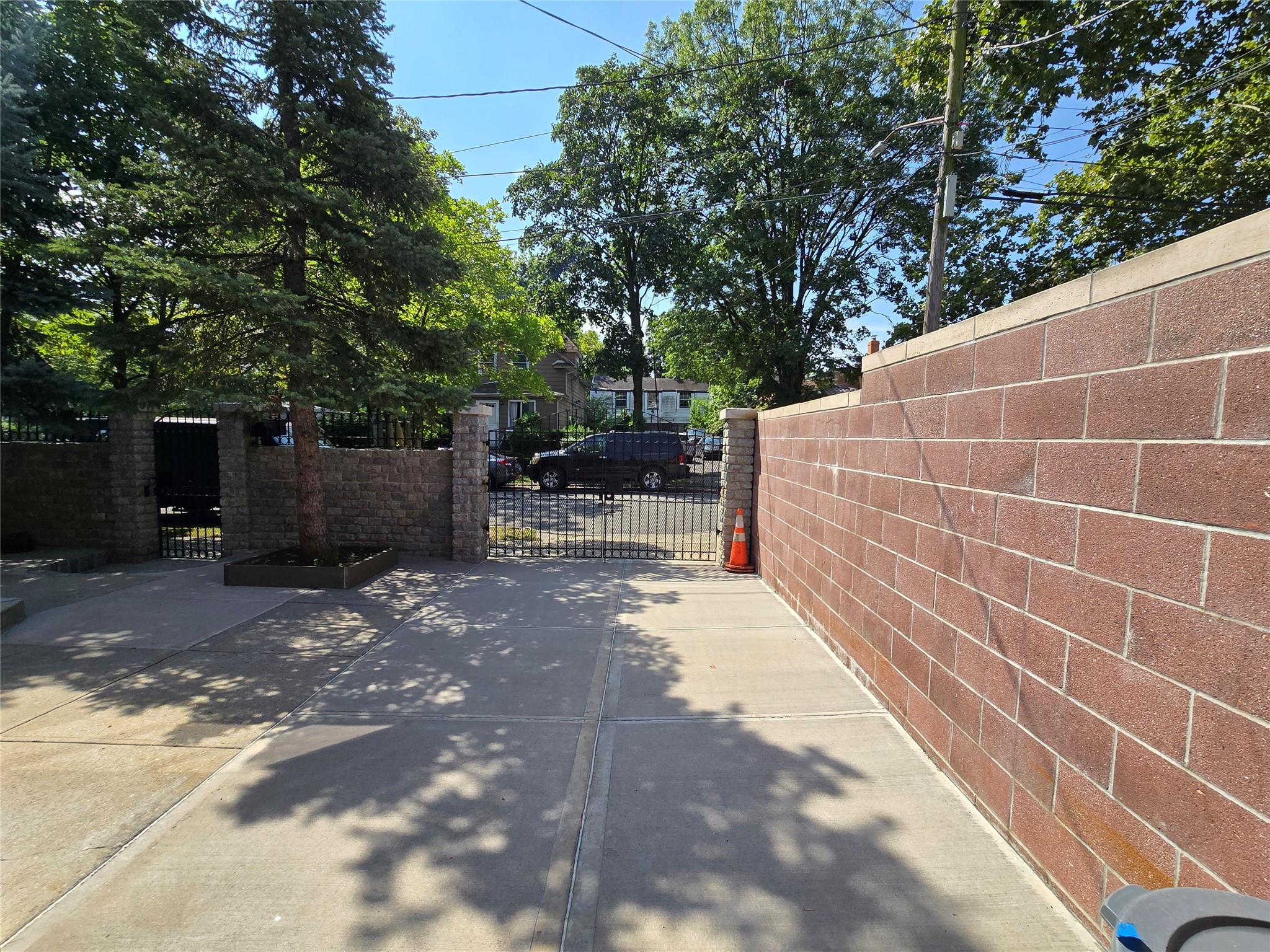 204-19 46th Road Queens, NY 11361 - Photo 3 of 23 a view of backyard with outdoor seating and plants