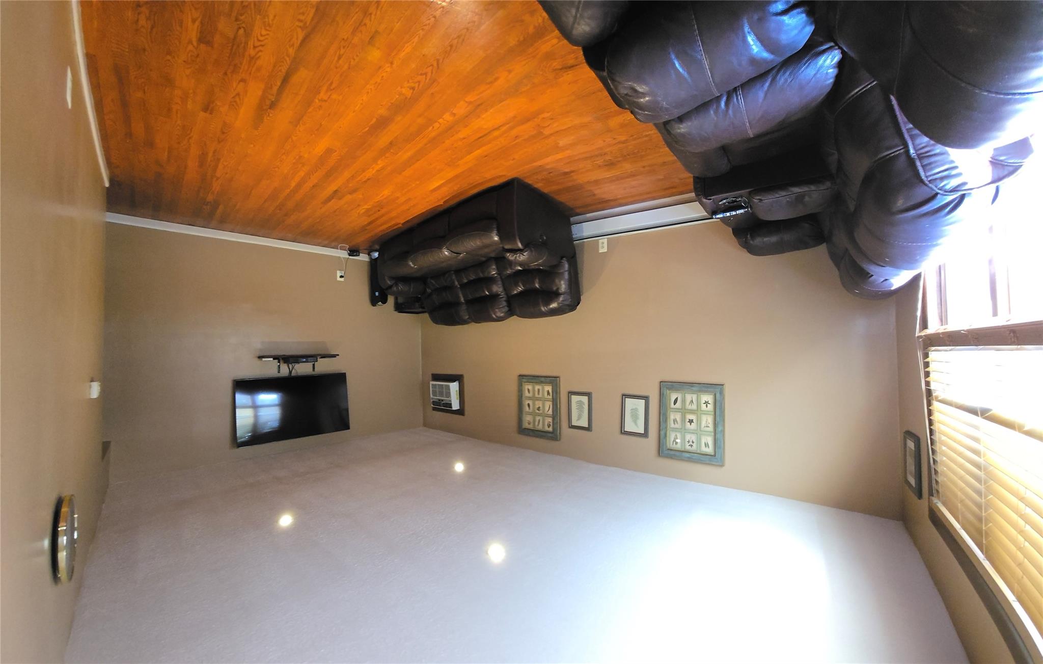 204-19 46th Road Queens, NY 11361 - Photo 4 of 23 a living room with furniture and a flat screen tv