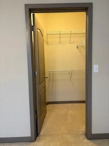 a view of a room with an empty door