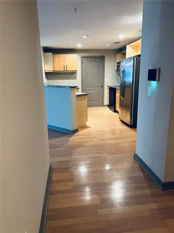 a view of a kitchen with a sink