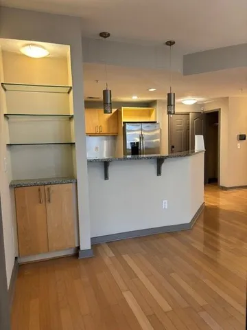 a view of a kitchen with a sink
