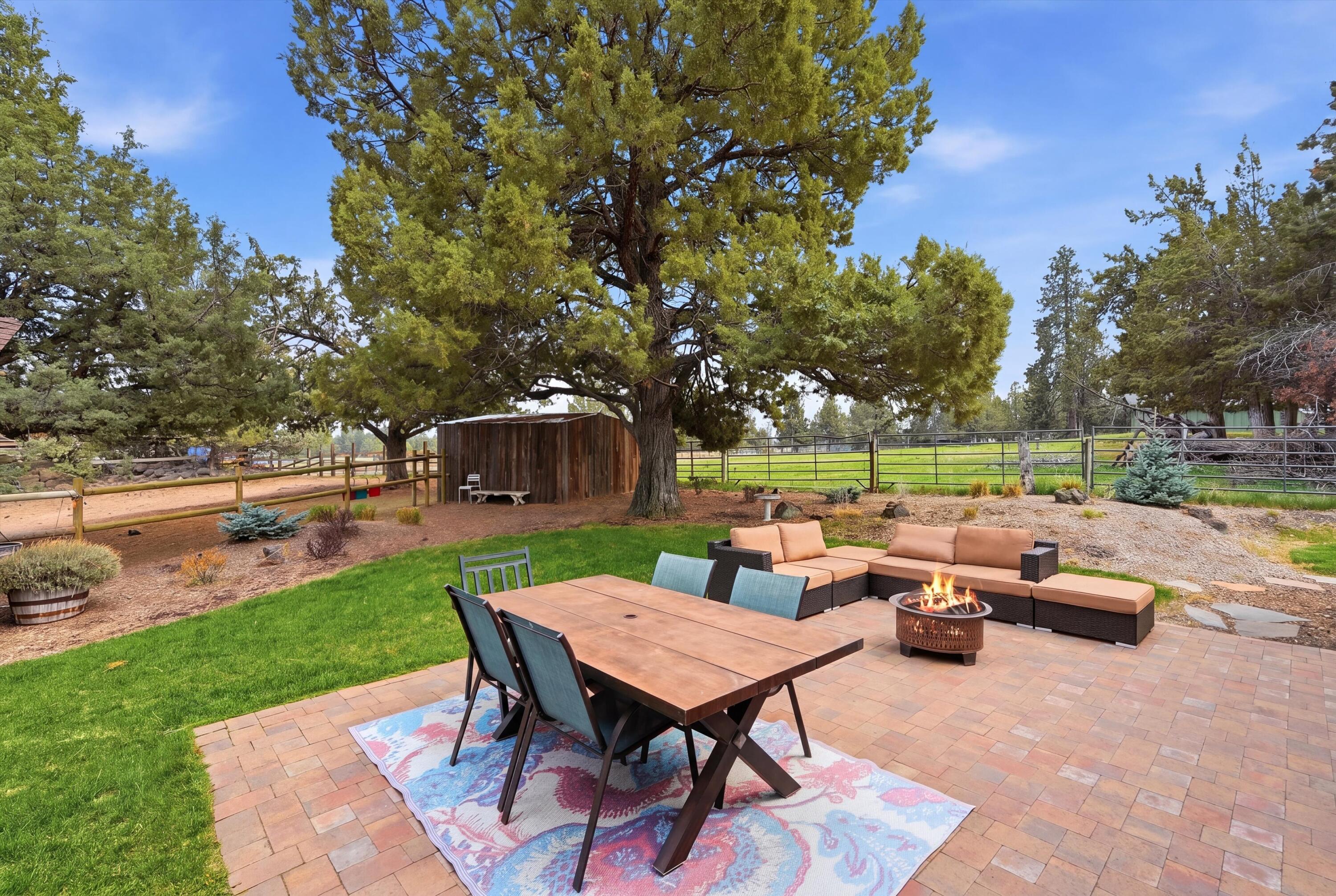 61280 Larsen Road Bend, OR 97702 - Photo 28 of 58 a view of a backyard with sitting area