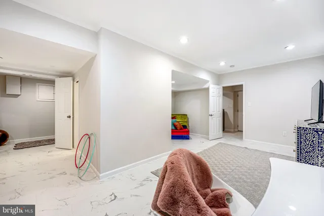 a utility room with sink dryer and washer