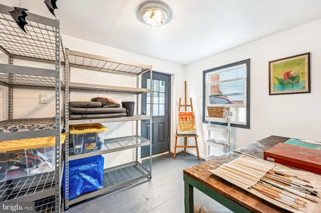 a view of an outdoor sitting area with furniture and garden