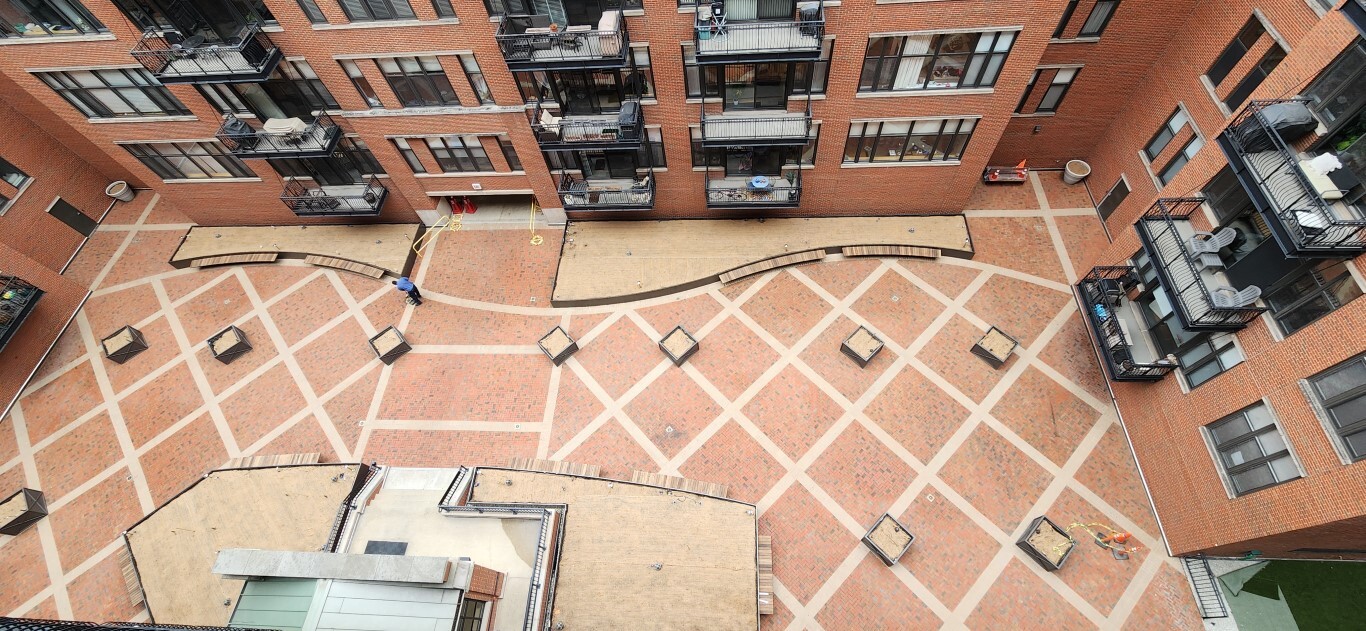 333 West Hubbard Street, Unit 607 Chicago, IL 60654 - Photo 15 of 15 front view of a brick building with many windows