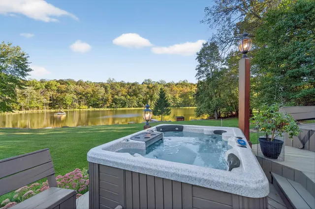 a view of a garden and swimming pool