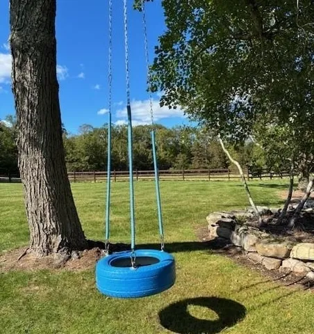 a view of a lake with a house in the background
