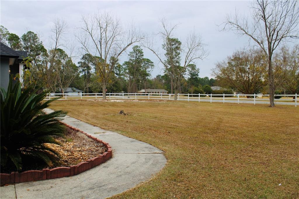 125 Trailwood Road Valdosta, GA 31602 - Photo 17 of 19 a view of a swimming pool and an outdoor space