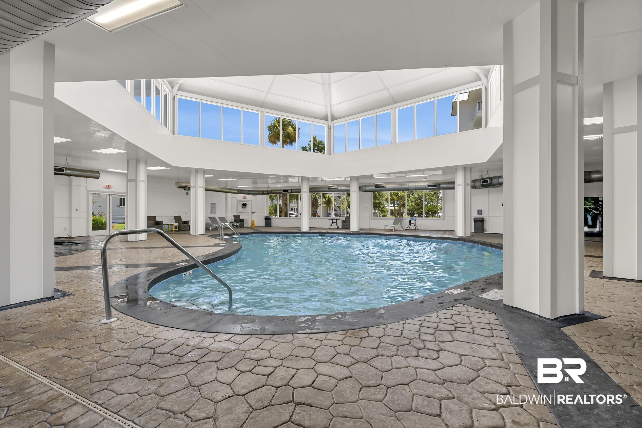 400 Plantation Road, Unit 2118 Gulf Shores, AL 36542 - Photo 32 of 59 Indoor pool with a custom-shaped basin and integrated handrails
