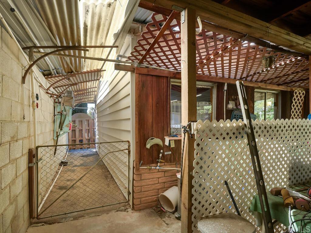 210 South Orange Avenue Fallbrook, CA 92028 - Photo 24 of 40 Walkway to the front driveway