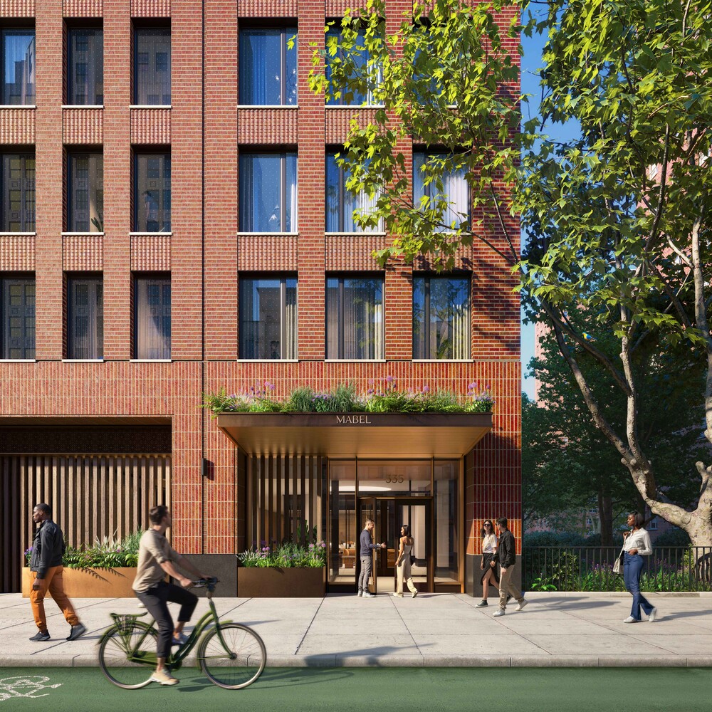 335 8th Avenue, Unit 717 Manhattan, NY 10001 - Photo 7 of 13 front view of a brick building