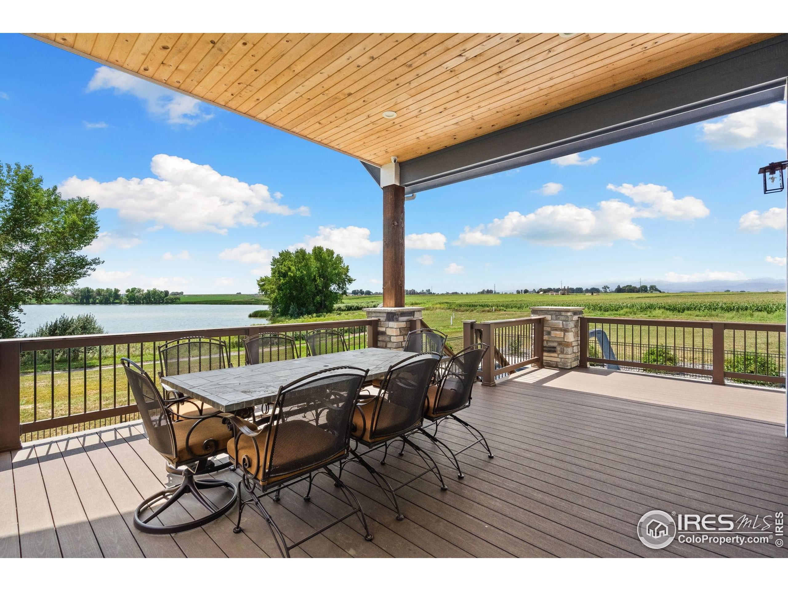 3324 Fox Crossing Place Loveland, CO 80537 - Photo 12 of 47 a view of balcony with couch and ocean view