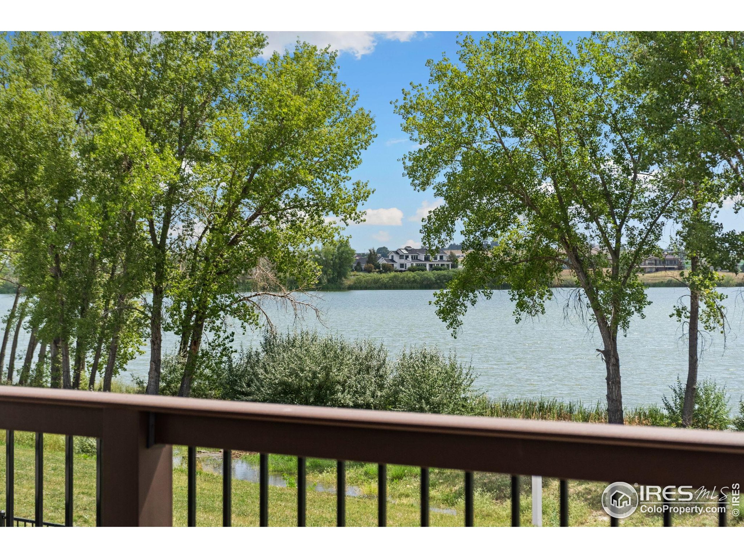 3324 Fox Crossing Place Loveland, CO 80537 - Photo 14 of 47 a view of lake from balcony