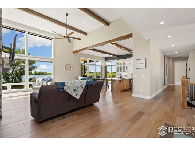 a kitchen with stainless steel appliances a sink stove and cabinets