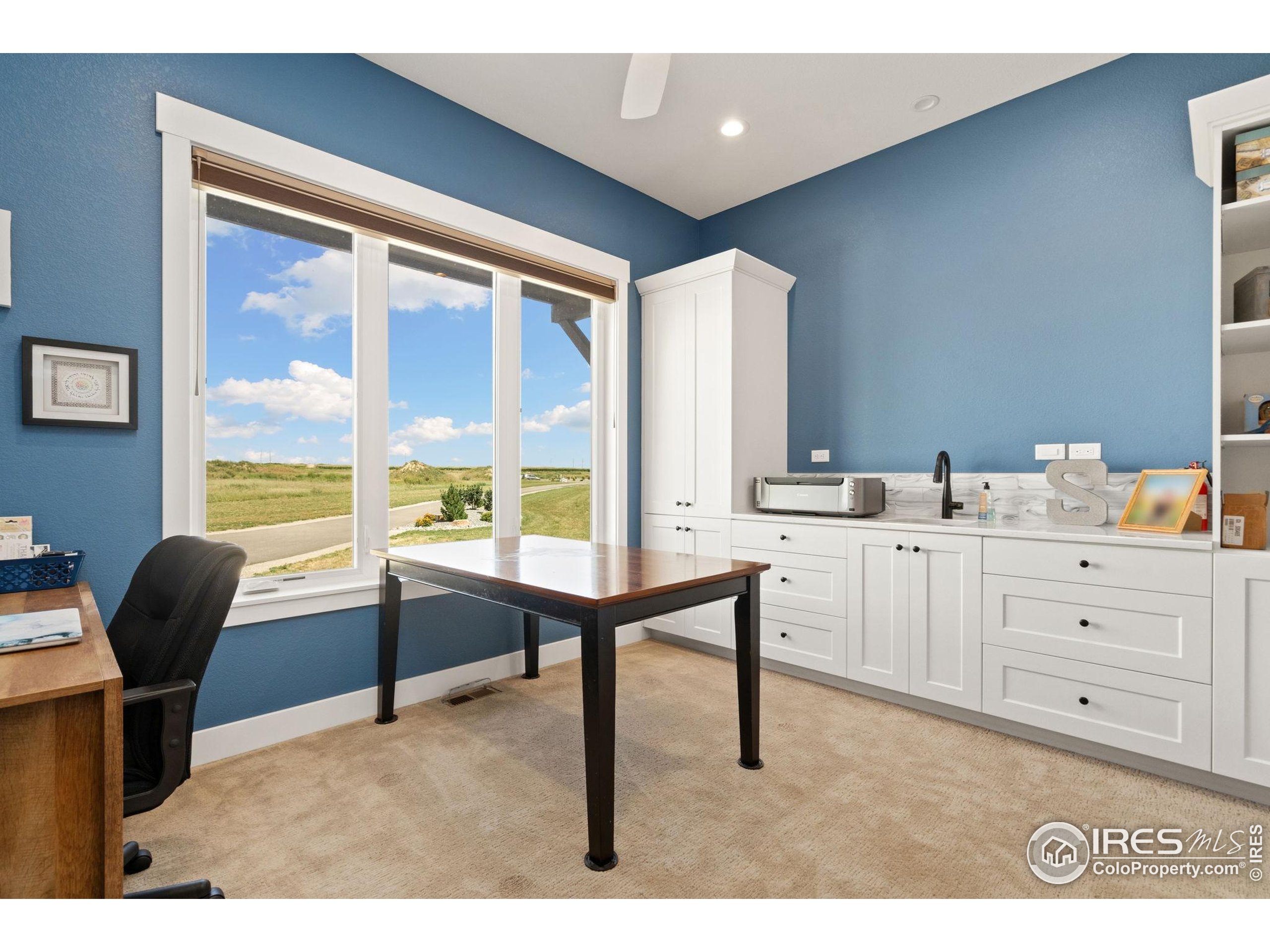 3324 Fox Crossing Place Loveland, CO 80537 - Photo 37 of 47 a workspace with furniture and window