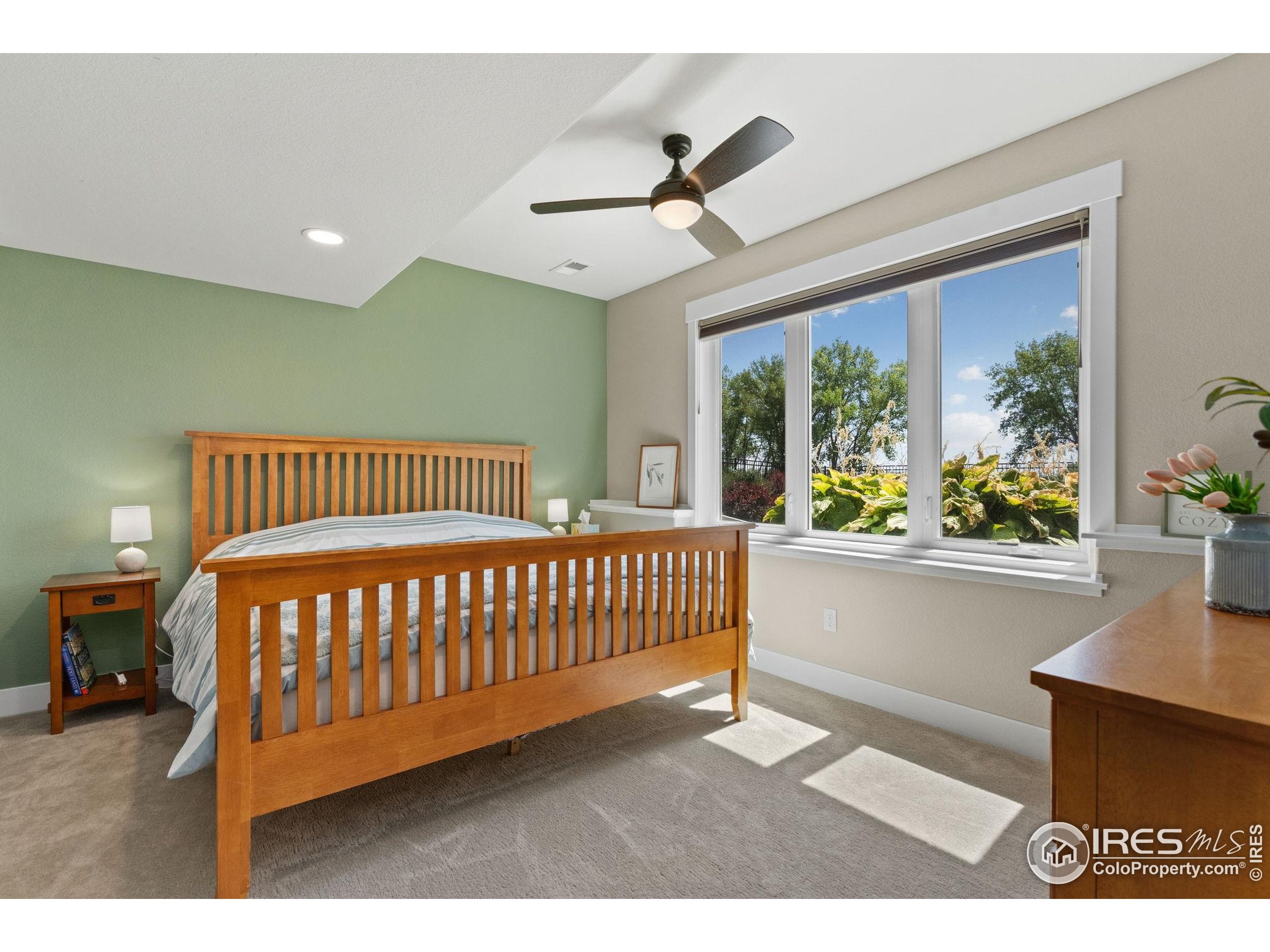 3324 Fox Crossing Place Loveland, CO 80537 - Photo 43 of 47 a bedroom with a bed and a window