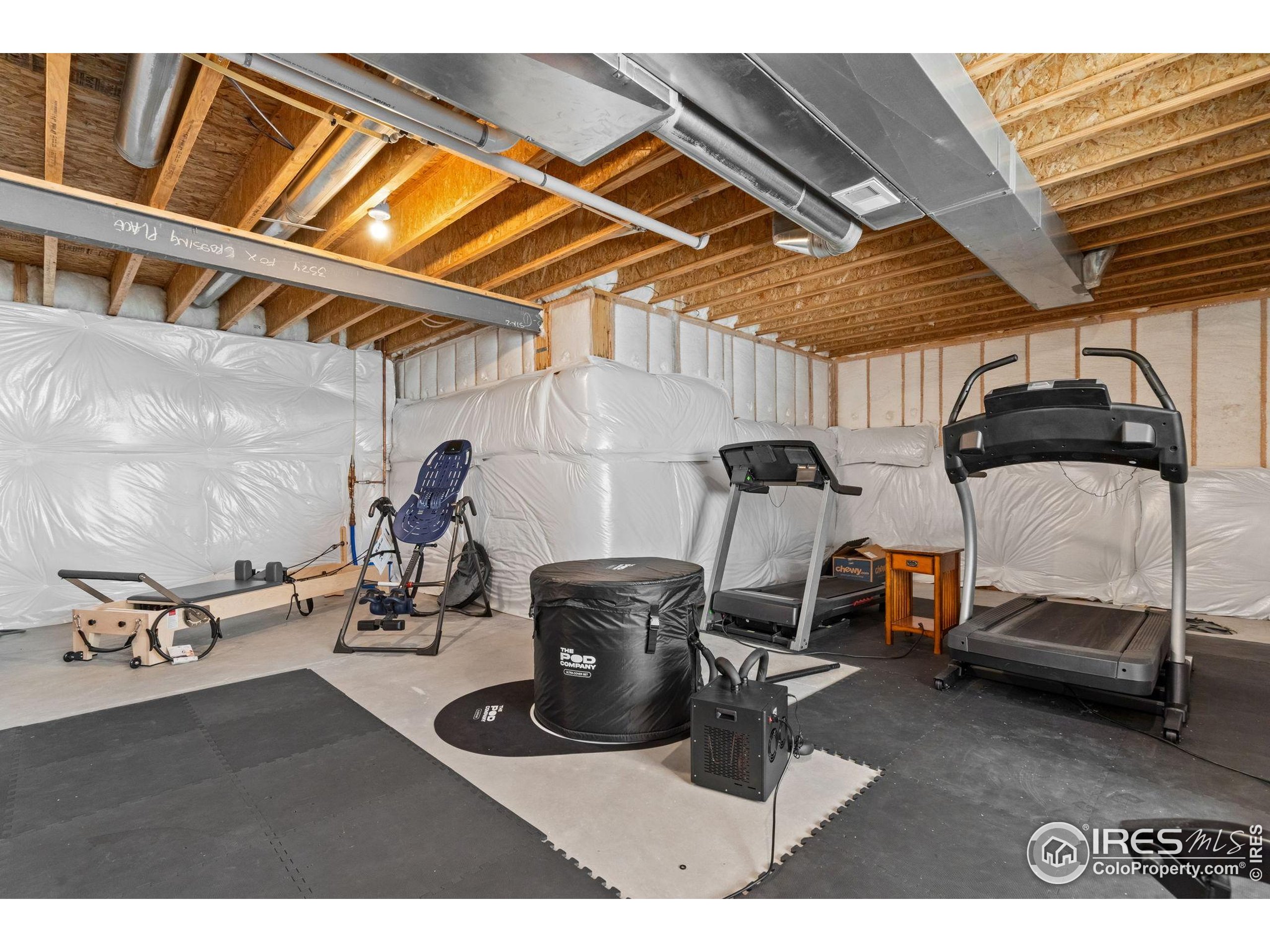 3324 Fox Crossing Place Loveland, CO 80537 - Photo 45 of 47 a view of a room with gym equipment