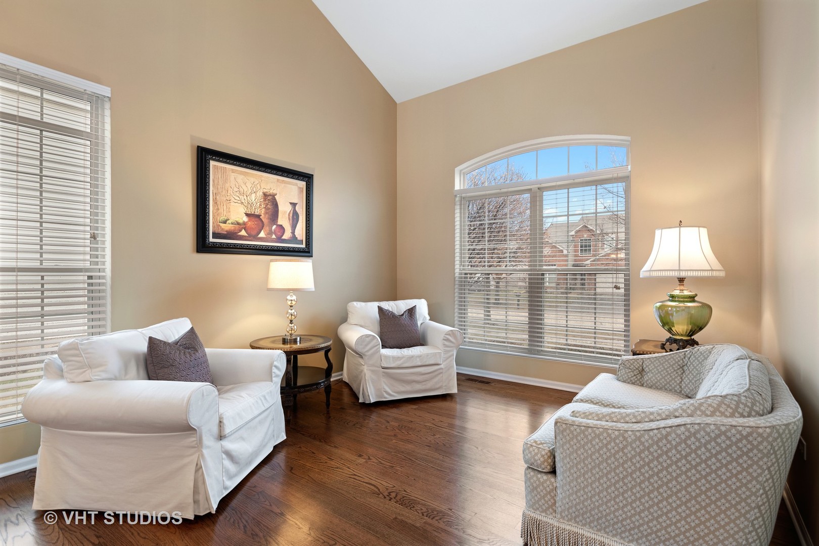 235 Stonegate Road Bolingbrook, IL 60440 - Photo 3 of 24 a living room with furniture and a large window