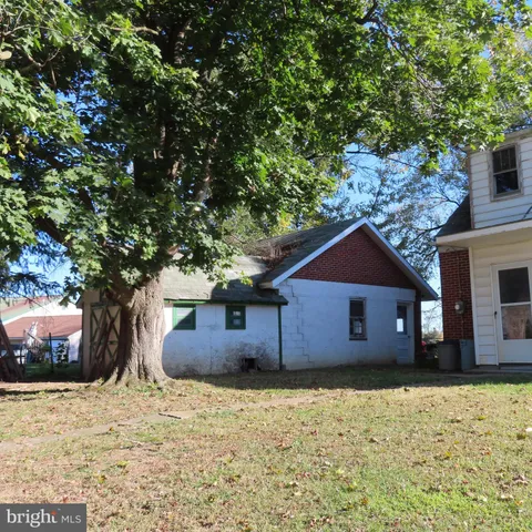 a front view of house with yard