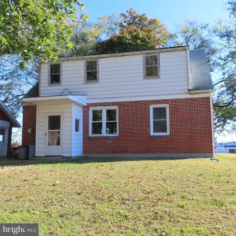 a bathroom with a sink and a shower