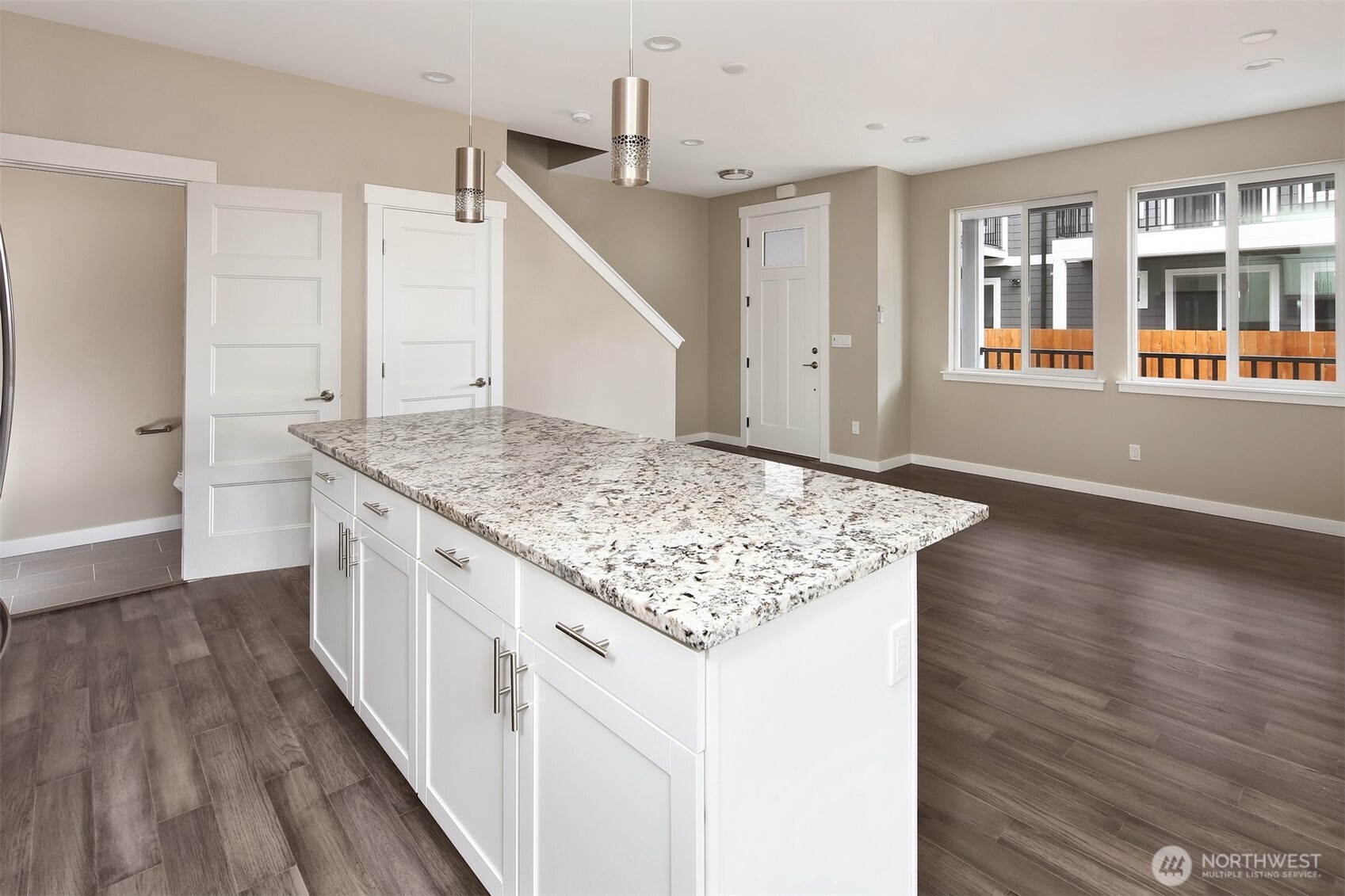 1515 North Waugh Road, Unit A Mount Vernon, WA 98273 - Photo 13 of 28 a kitchen with stainless steel appliances granite countertop a sink stove and cabinets