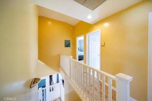 a spacious bedroom with a bed and a window