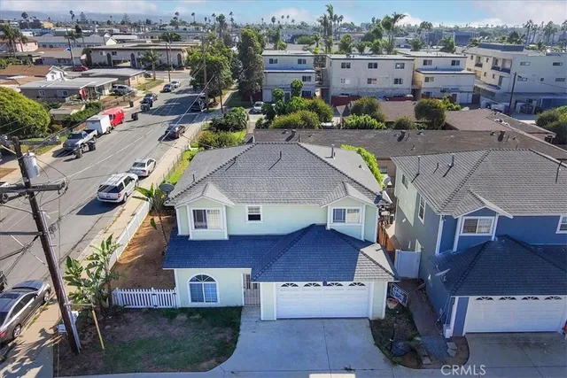 a kitchen with cabinets stainless steel appliances and a counter space