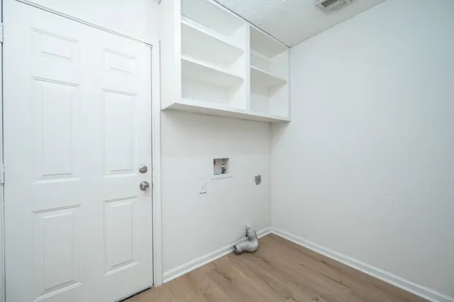 a view of an empty walk in closet