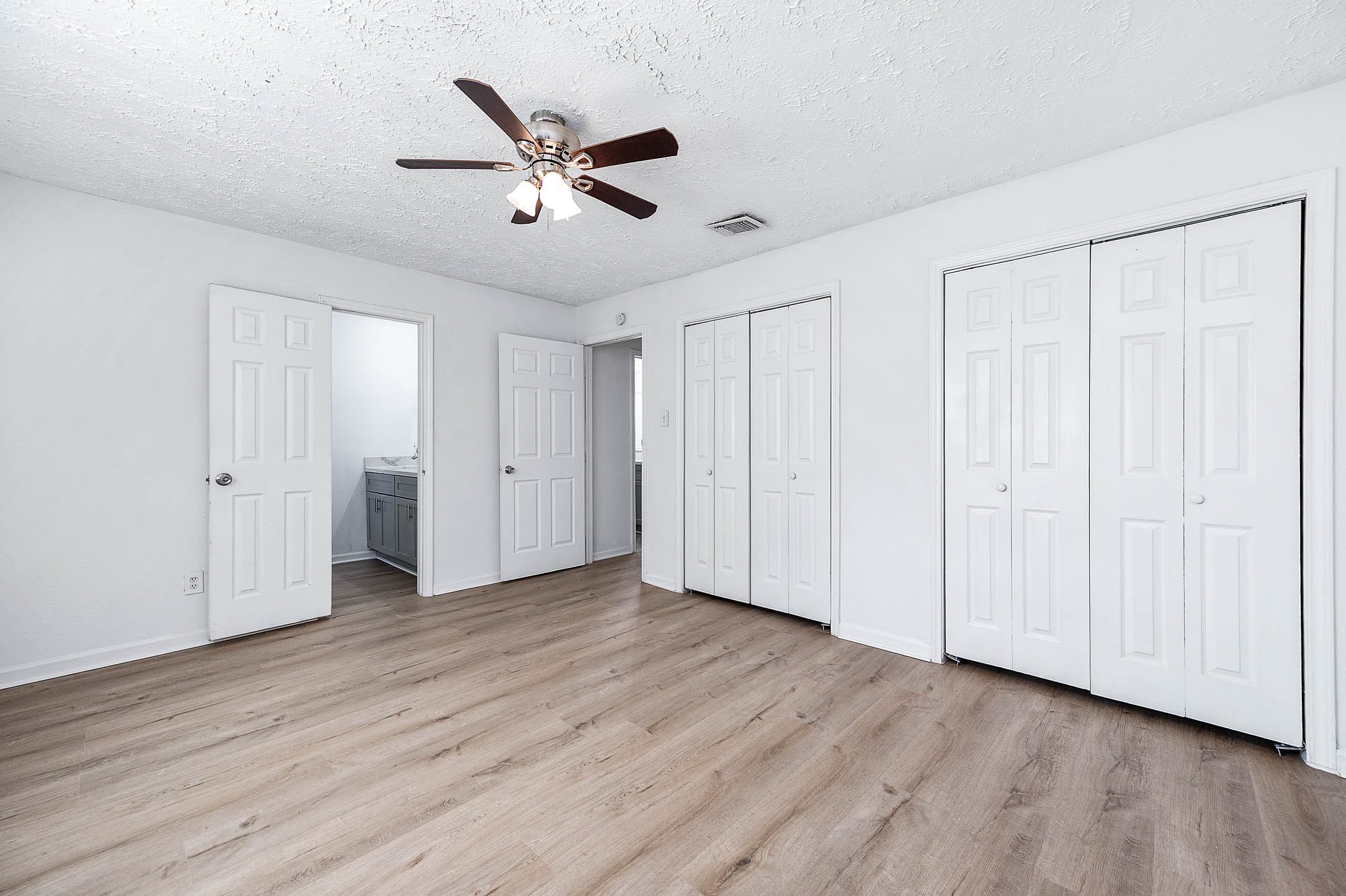 24007 Pepperrell Pl Street Katy, TX 77493 - Photo 20 of 24 a view of an empty room and wooden floor