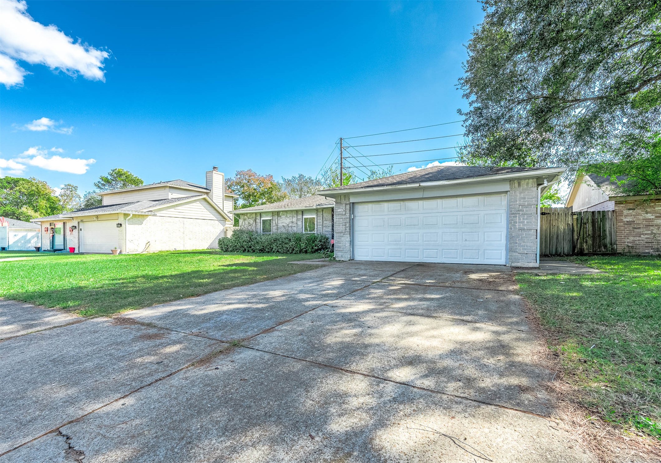 24007 Pepperrell Pl Street Katy, TX 77493 - Photo 2 of 24 a front view of house with yard and garage