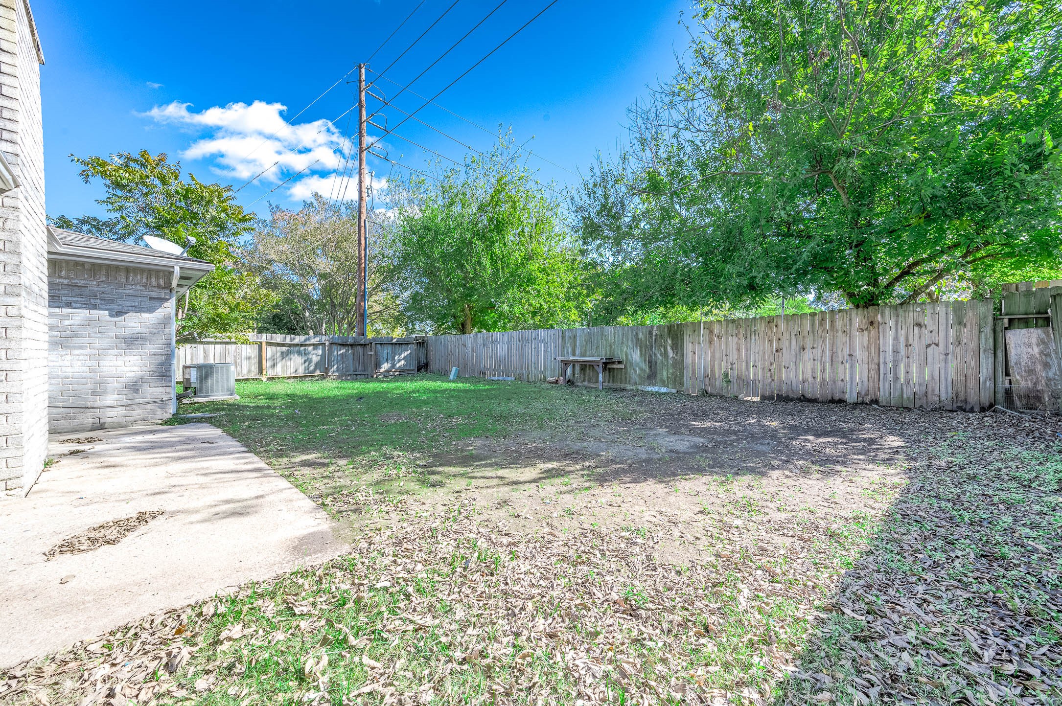 24007 Pepperrell Pl Street Katy, TX 77493 - Photo 22 of 24 a view of a backyard with tree s