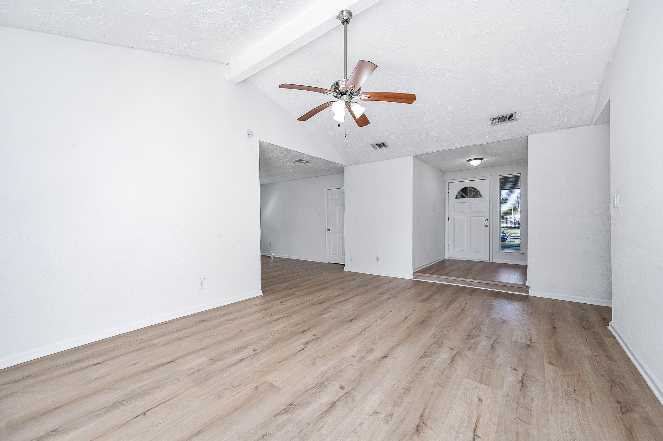24007 Pepperrell Pl Street Katy, TX 77493 - Photo 8 of 24 a view of empty room with wooden floor