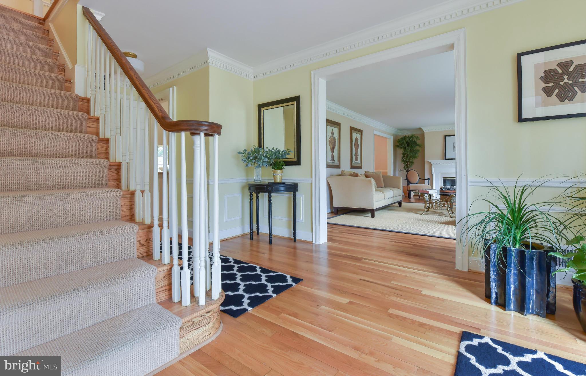 7704 Burford Drive McLean, VA 22102 - Photo 2 of 30 a living room with furniture and a potted plant