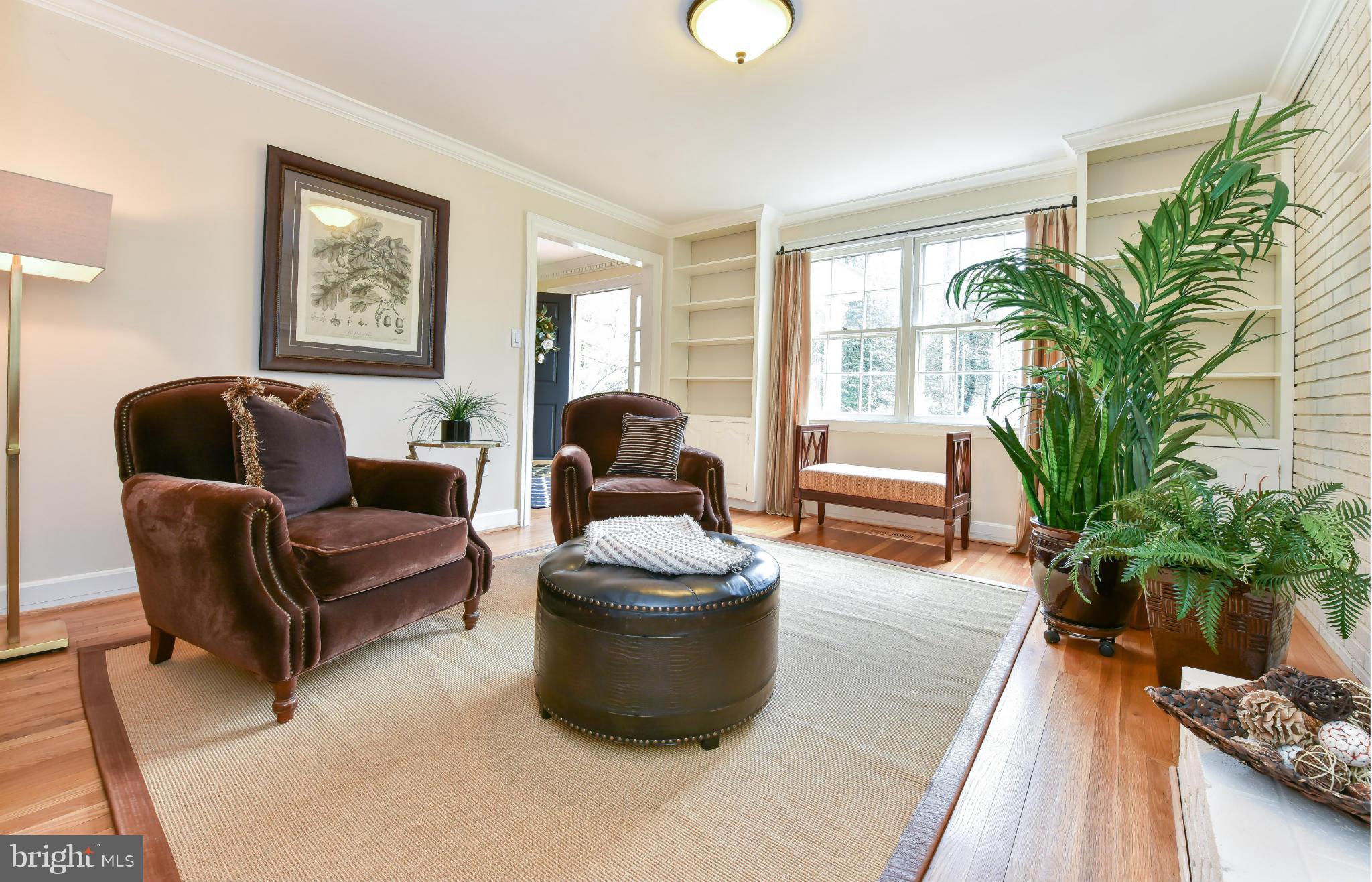 7704 Burford Drive McLean, VA 22102 - Photo 11 of 30 a living room with furniture and a potted plant
